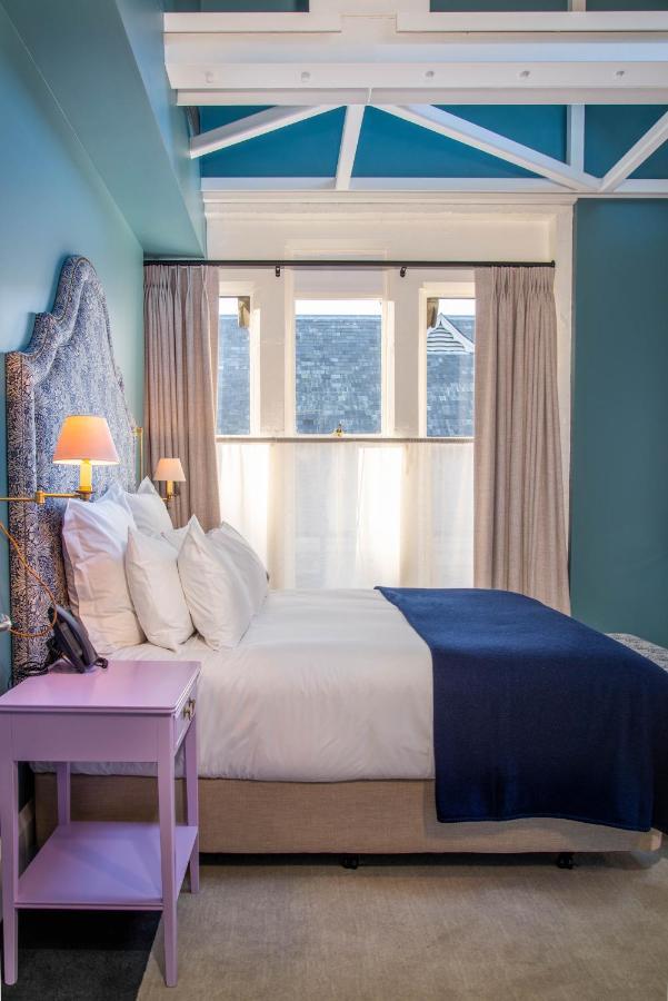 The Observatory Hotel ไครสต์เชิร์ช ภายนอก รูปภาพ A bedroom at the hotel